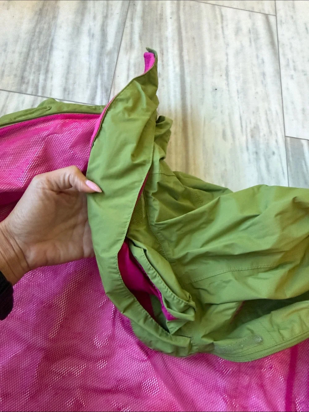 The North Face Olive Green Raincoat with Pink Lining